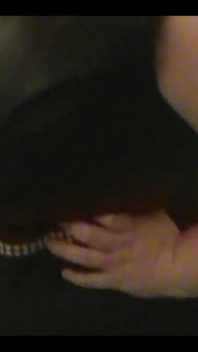 Robe-wearing Dominatrix