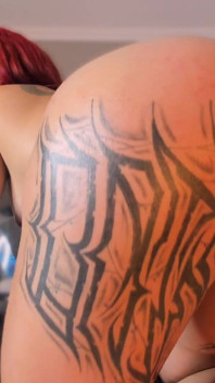 Latina Shakes Her Tattooed Butt