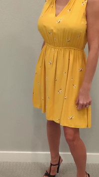 Stella in a Yellow Sun Dress with Black Heels