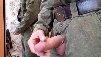 AlexRusFun: A Russian soldier in military uniform and dirty socks jerks...