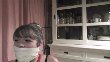 Restricting Ropes: Tied up to a chair and tape gagged