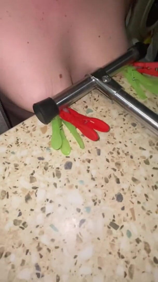 Elena917: tits with clamps and pressing - solo
