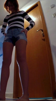 Skinny Redhead Pee in Her Short Jeans