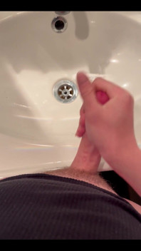 Masturbating
