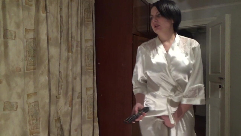 Sexy Milf: Sexy housewife in silk white robe desperating to pee long...