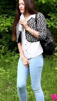 Desperate Brunette Feels Her Bladder so Full She Is in Danger of Pissing in Her Jeans in the Woods