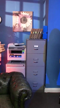 HornyIn the office the sexy MILF plays with strap-on