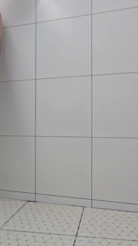 Sissy Kanisa Is Taking Shower in White Shower Room