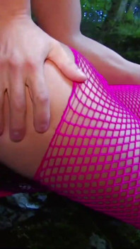 Brunette teen in fishnet gets fucked outdoors