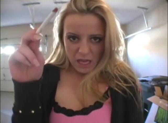 Femdom Austria: Blonde bitch smoking a cigarette in a close up video