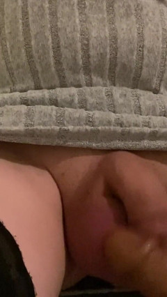 Sissy Crossdresser in tight dress and thigh high stockings with cock sleeve sheath panties shows off and sucks on a big dildo