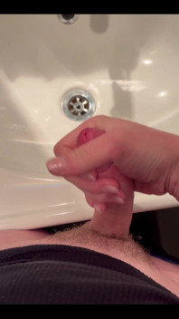 Masturbating
