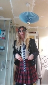 Horny Sissy in Uniform Loves Her Precum