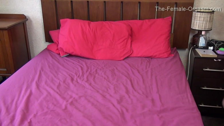 The Female Orgasm: Girl in fishnets masturbates on bed