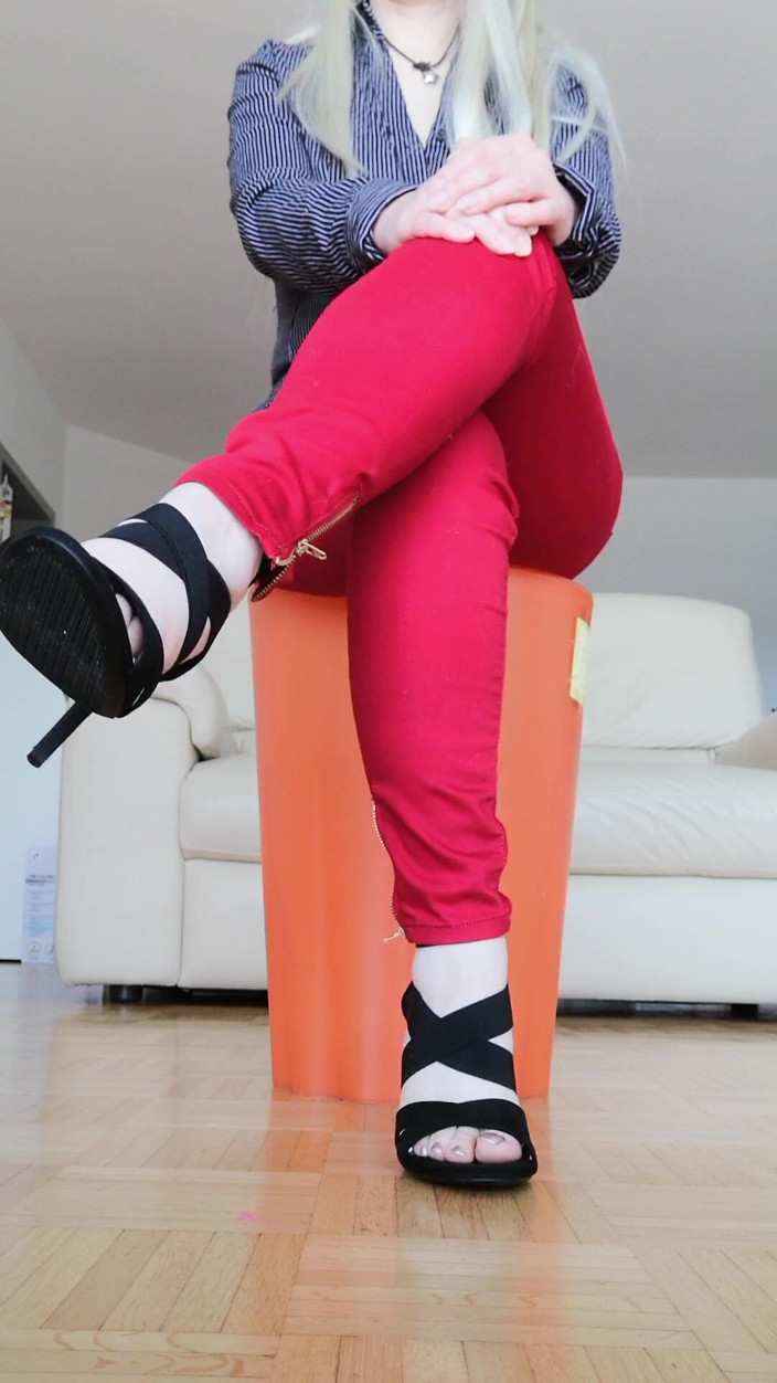RavenBigAss: Raven Toe-tapping with Crossed Legs Red Jeans and High-heeled Sandals