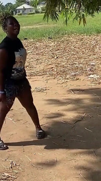 African Ebony Sexy Black Girl Dances in Public with Laughter