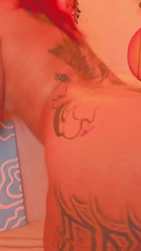 A Latina with a Tattooed Body Is Shaking Her Butt for You