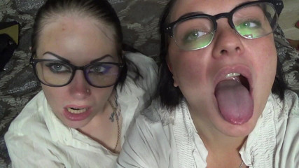 Goddess Misha Goldy: Two business women taunt you with their mouths & tongues before...