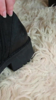 Rugged Elegance - Worn Tights & Biker Boots in a Black Minidress