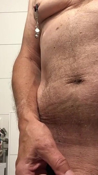 Showing Hard Nipples off While Pissing
