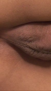 A beautiful Asian woman comes back from a walk and relaxes by stroking his cock