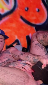 Tattooed Tboy XXX Skips Stretches His Pink Boy Pussy with an Xl Cross Dildo