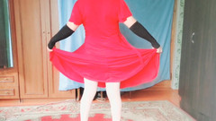 Kitty_Cross: Söt femboy som lutar på balkongräcke vid solnedgången