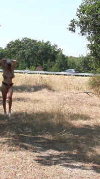 The Littl Tih Girl Shows off Her Tits to the Cars