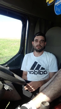 Jerking off in Shorts in a Parked Truck and Smoking a Cigarette