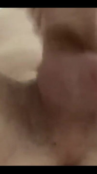 Masturbating