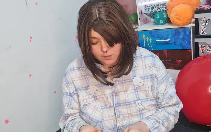Dramatic Dumpster Fire: Girl Pumps up Sausage Balloons