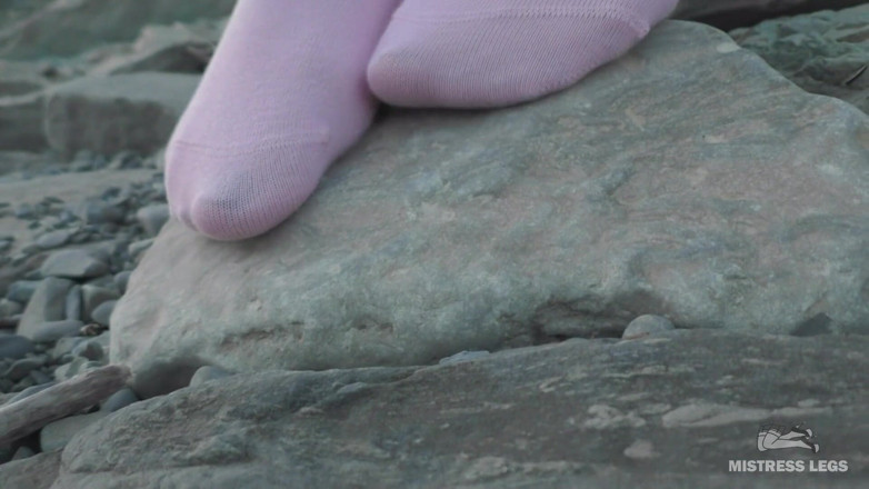 Mistress Legs: Sexy feet in pink ankle socks on the seashore