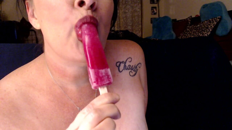 Abby Anna: Popsicle sucking busty milf slurp