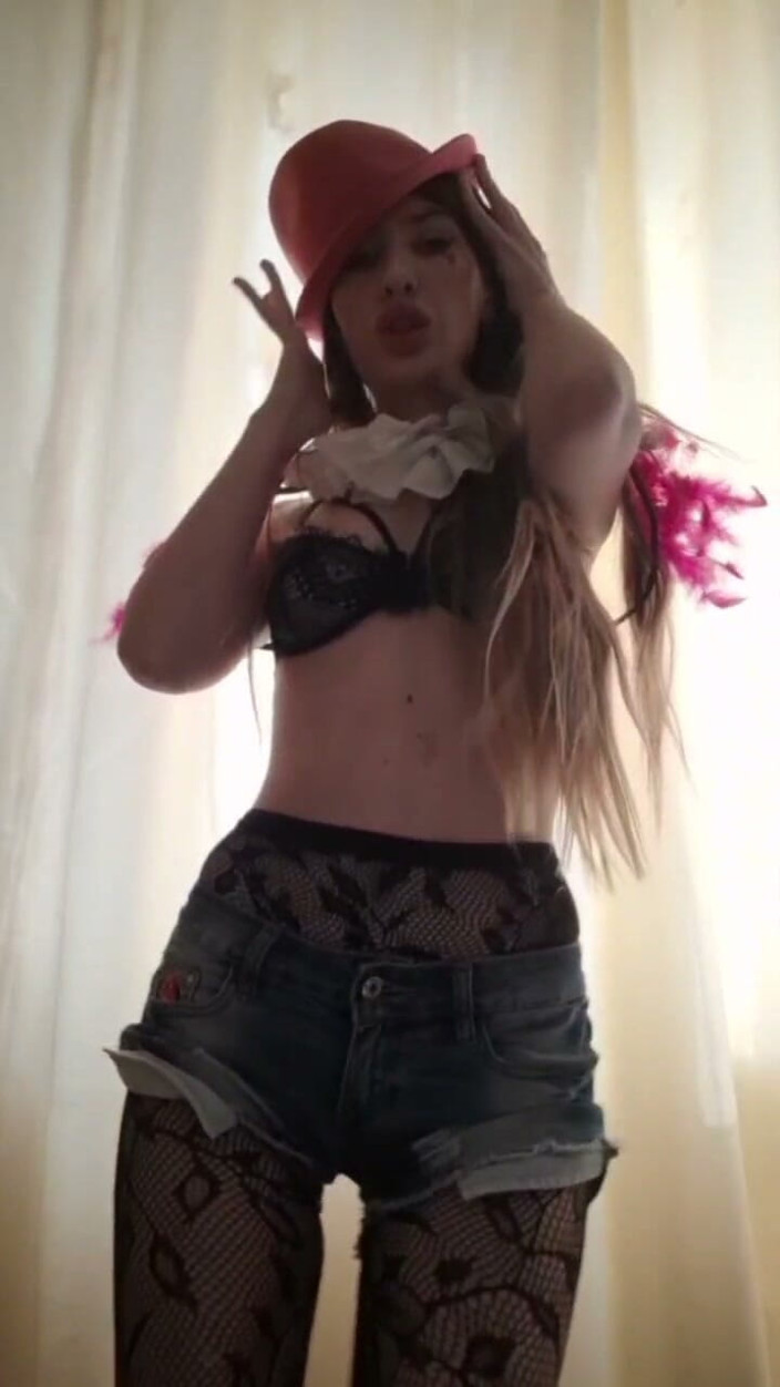ElzaKom: On Your Knees, Look up at My Pink Fedora, and...
