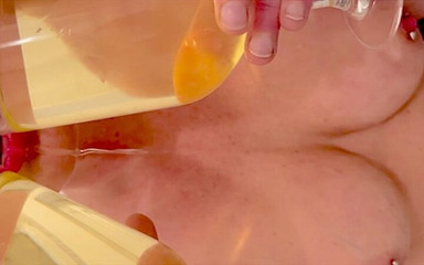 Thumbnail of Filled up Two Glasses by My Strong Stream Pee and Next Put in My Mouth and Spitting on My Big Tits