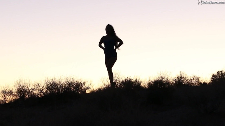 Babe Stare: Sexy Tia girl is nude but only teases in silhouette