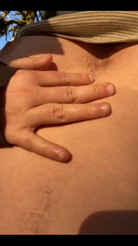 Enjoying the Evening Sun Kissing My Hairy Nipples, Chest, Tummy, and Bush!