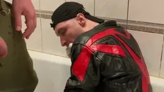 Big Man in Leather Jacket Pissing on Leather Moto Biker