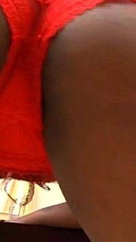 Black Slut with Colored Hair Sucks a Real Big Black Cock