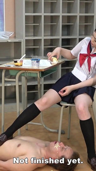 College Girl Stretches Her Legs Under the Desk While Studying and Plays with Teacher's Dick