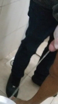Paloma Veiga and Masked in a Public Bathroom
