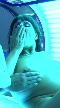 Busty Nadiene Blows Cock in Solarium