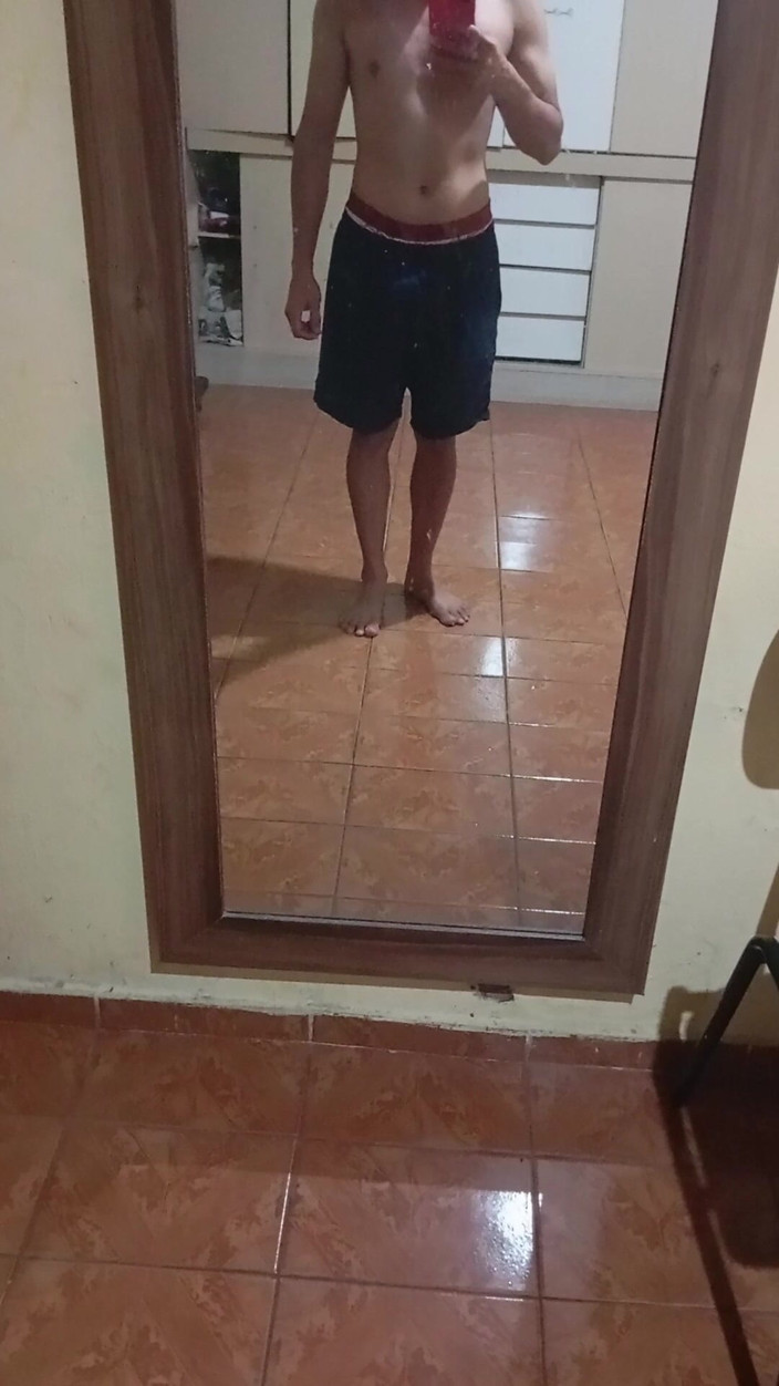 Ray Oliver: Boy in Shorts in the Mirror