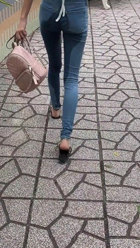 Public Wetting Jeans in Park Near the Beach