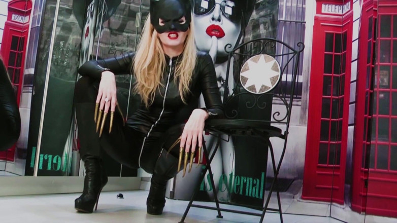 Goddess Celine: Between catwoman 's claws
