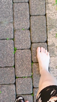 Walking with My Feet on the Grass and Showing Them to You up Close