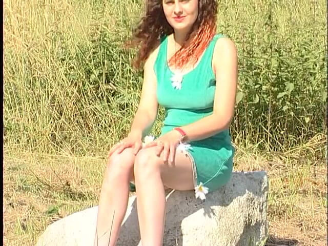 Dirty Teeny: Busty redhead teen lifting dress outdoors