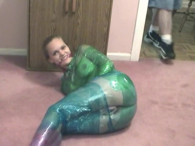 Dangerous Teens: Fetish chick loves being wrapped in green plastic with her...