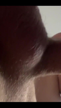 Masturbating