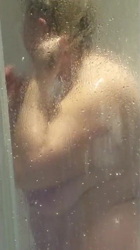 Watch Julie in the Shower Getting Ready for Client